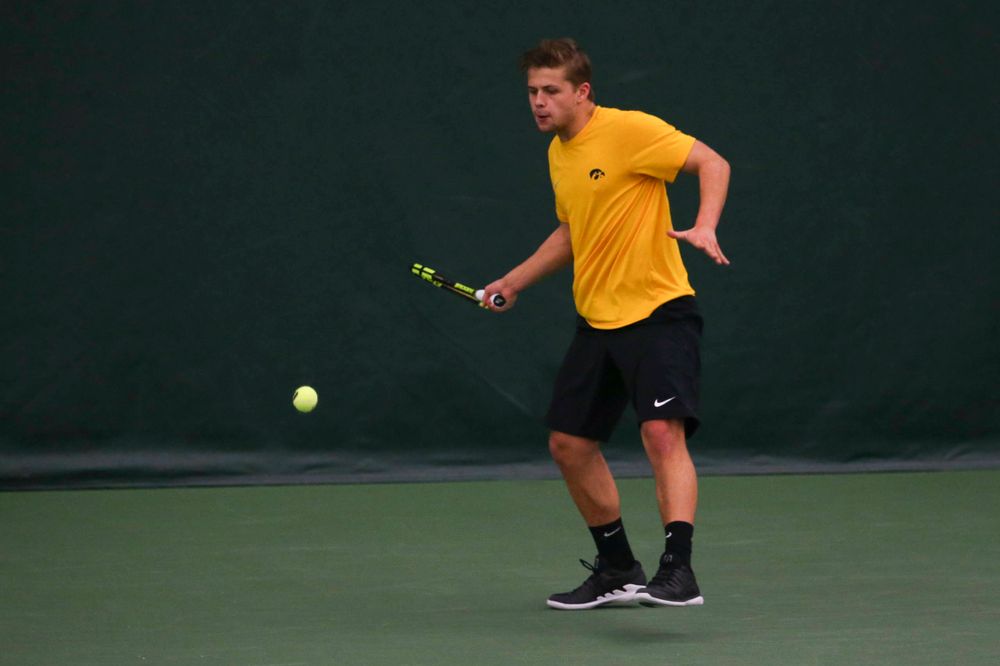 Iowa's Will Davies at a tennis match vs Drake Friday, March 8, 2019 at the Hawkeye Tennis and Recreation Complex. (Lily Smith/hawkeyesports.com)