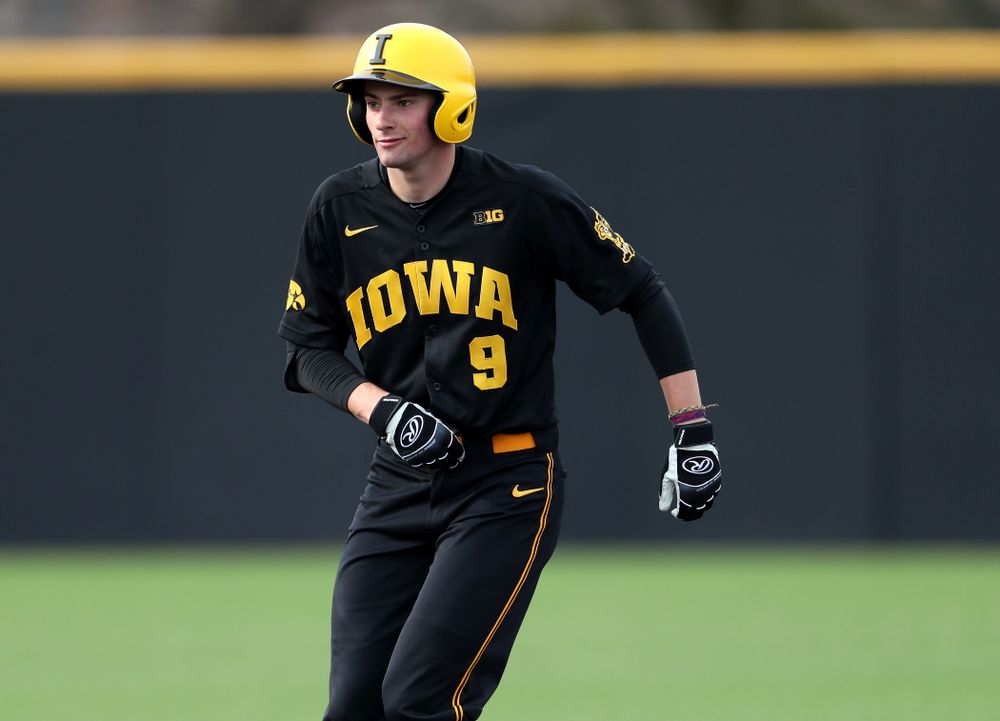 Iowa Hawkeyes outfielder Ben Norman (9) doubles against Simpson College Tuesday, March 19, 2019 at Duane Banks Field. (Brian Ray/hawkeyesports.com)