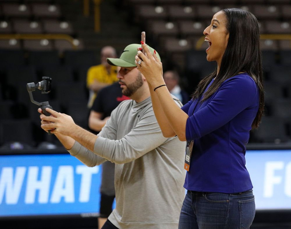 Christy Winters Scott, analyst for ESPN, watches in amazement as Iowa Hawkeyes forward Megan Gustafson (not picture) runs a drill at a practice during the 2019 NCAA Women's Basketball Tournament at Carver Hawkeye Arena in Iowa City on Saturday, Mar. 23, 2019. (Stephen Mally for hawkeyesports.com)