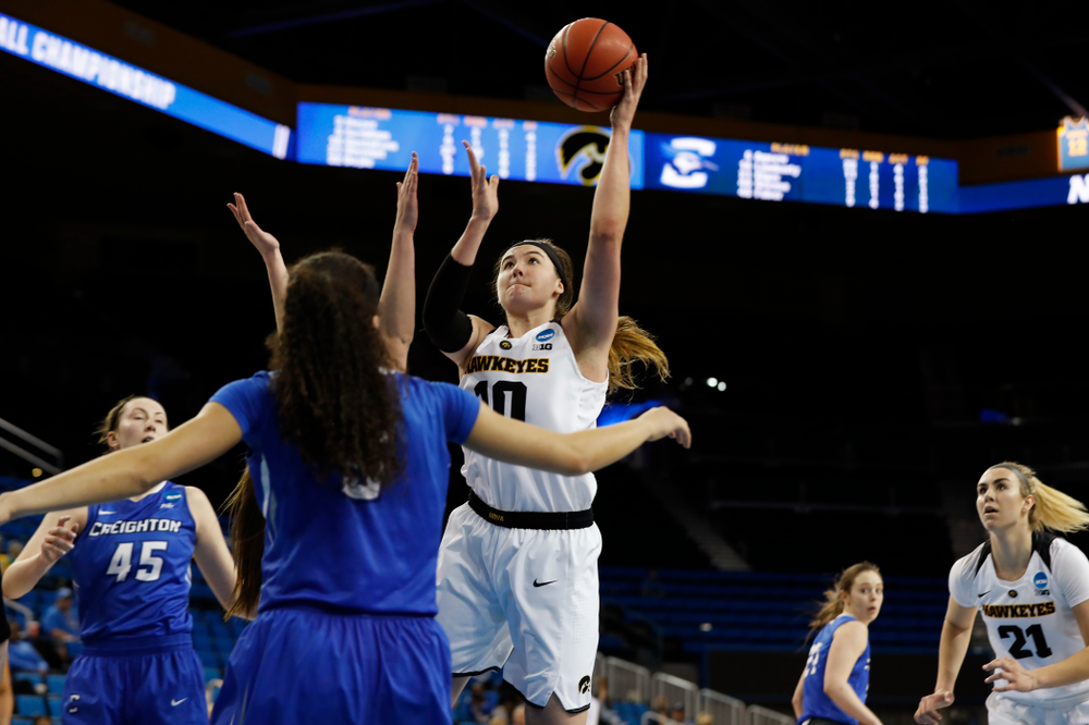 Iowa Hawkeyes forward Megan Gustafson (10) goes to the hoop against the Creighton Bluejays in the first round of the 2018 NCAA Women's Basketball Tournament Saturday, March 17, 2018 at Pauley Pavilion on the campus of UCLA. (Brian Ray/hawkeyesports.com)