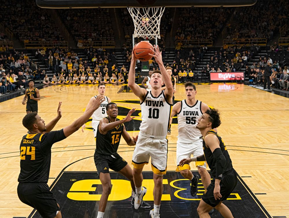Iowa Hawkeyes guard Joe Wieskamp (10) drives in and scores during the second half of their their game at Carver-Hawkeye Arena in Iowa City on Sunday, December 29, 2019. (Stephen Mally/hawkeyesports.com)