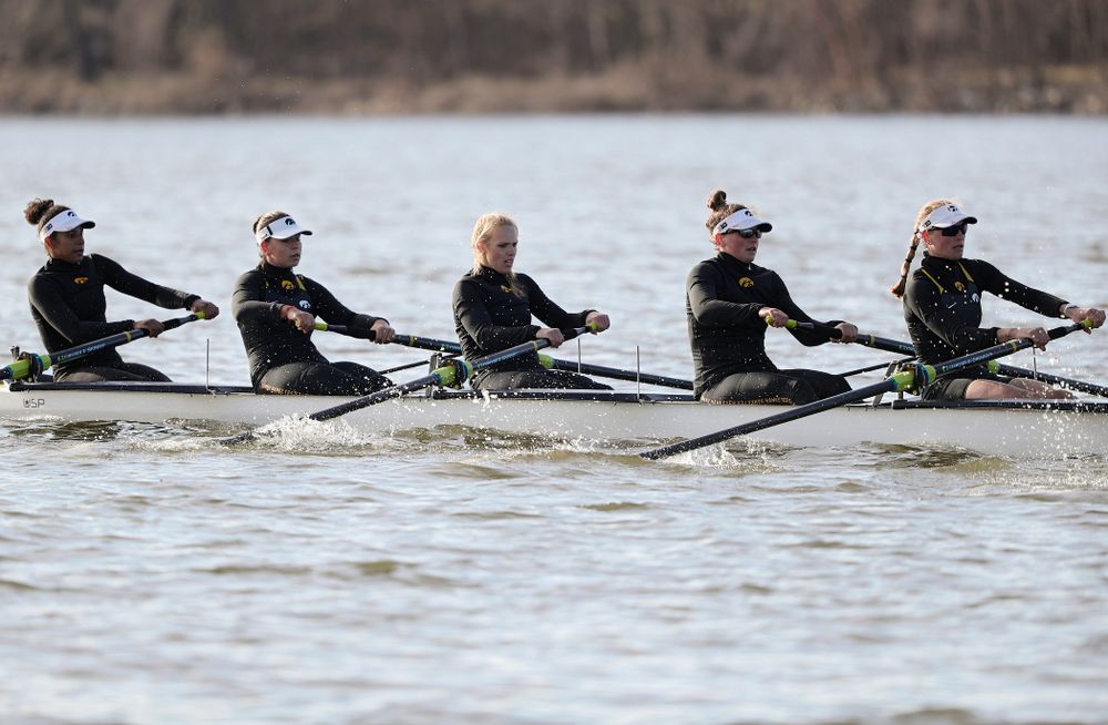 Iowa's Naomi Visser (from left), Elena Waiglein, Paige Schlapkohl, Hannah Greenlee, and Hunter Koenigsfeld during their I Varsity 8 race against Minnesota in their Big Ten Double Dual Rowing Regatta at Lake Macbride in Solon on Saturday, Apr. 13, 2019. (Stephen Mally/hawkeyesports.com)