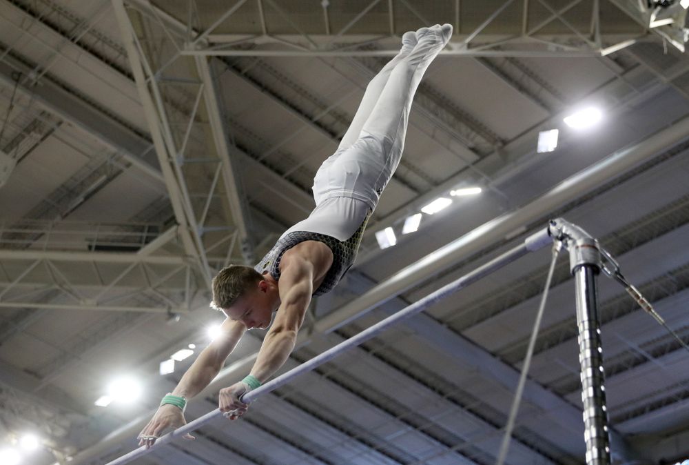 Iowa’s Carter Tope competes on the high bar against UIC and Minnesota Saturday, February 1, 2020 at Carver-Hawkeye Arena. (Brian Ray/hawkeyesports.com)