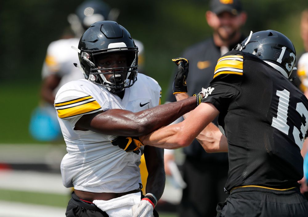 Iowa Hawkeyes defensive back Michael Ojemudia (11) during fall camp practice No. 9 Friday, August 10, 2018 at the Kenyon Practice Facility. (Brian Ray/hawkeyesports.com)