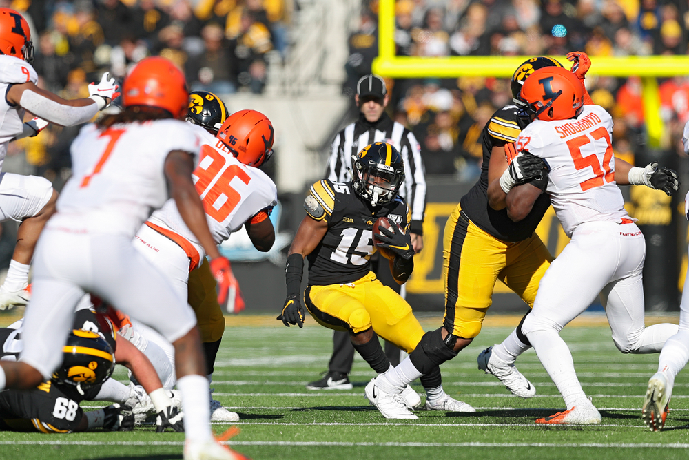 Iowa Hawkeyes running back Tyler Goodson (15) makes a cut on a run during the first quarter of their game at Kinnick Stadium in Iowa City on Saturday, Nov 23, 2019. (Stephen Mally/hawkeyesports.com)