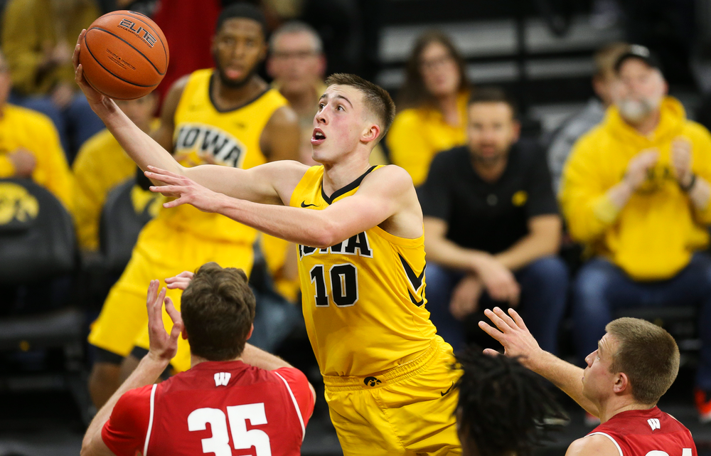 Iowa Hawkeyes guard Joe Wieskamp (10) goes up for a layup against Wisconsin on November 30, 2018 at Carver-Hawkeye Arena. (Tork Mason/hawkeyesports.com)