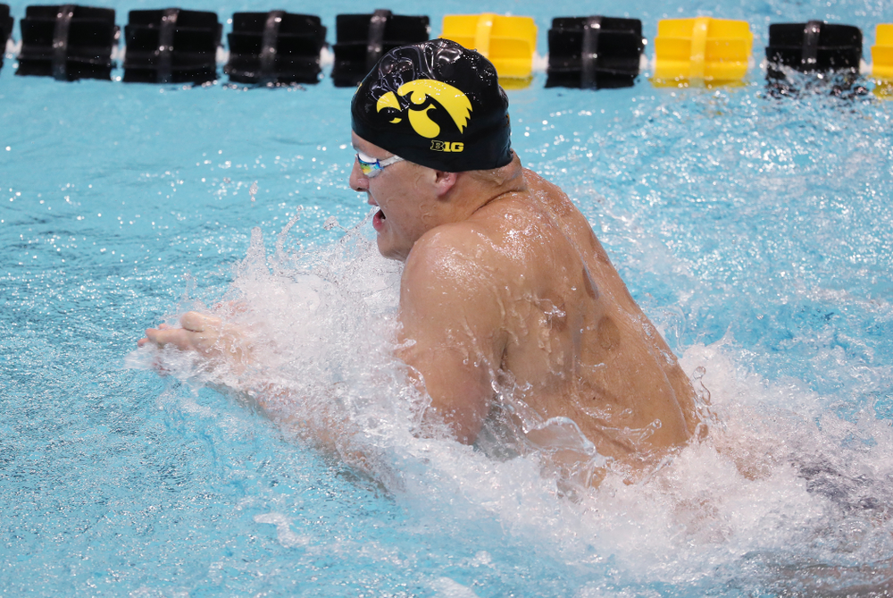 IowaÕs Will Myhre swims the breaststroke leg of the 200 Medley Relay against Notre Dame and Illinois Saturday, January 11, 2020 at the Campus Recreation and Wellness Center. (Brian Ray/hawkeyesports.com)