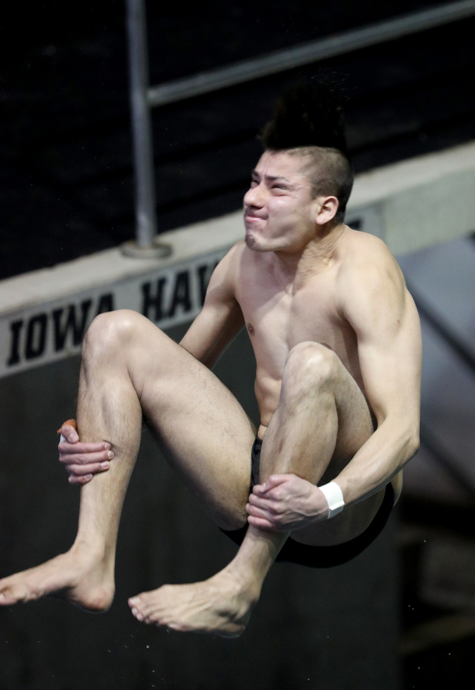 IowaÕs Jonatan Posligua competes on the 1 meter springboard against Notre Dame and Illinois Saturday, January 11, 2020 at the Campus Recreation and Wellness Center. (Brian Ray/hawkeyesports.com)