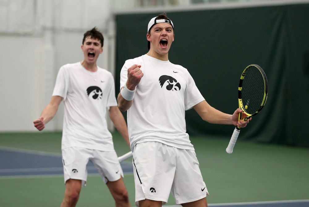Iowa’s Joe Tyler and Matt Cleggle celebrating after winning a doubles match against Cornell Sunday, March 8, 2020 at the Hawkeye Tennis and Recreation Center. (Brian Ray/hawkeyesports.com)