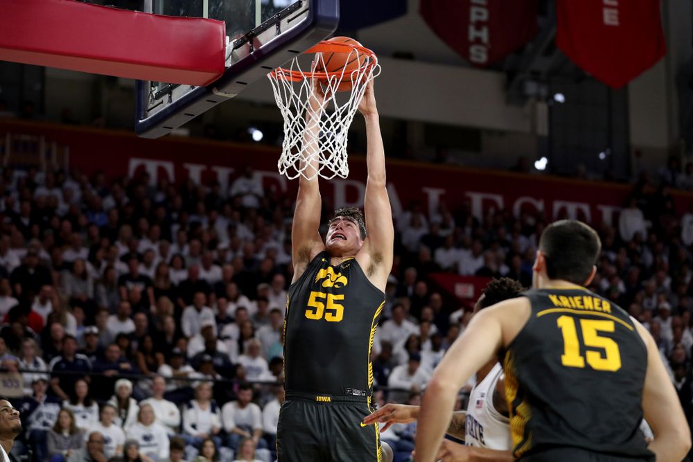 Iowa Hawkeyes forward Luka Garza (55) dunks the ball against Penn State Saturday, January 4, 2020 at the Palestra in Philadelphia. (Brian Ray/hawkeyesports.com)