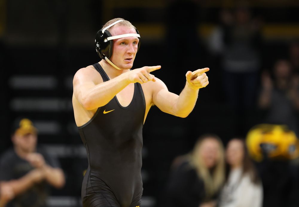 Iowa's Kaleb Young wrestles Purdue's Griffin Parriott at 157 pounds Saturday, November 24, 2018 at Carver-Hawkeye Arena. (Brian Ray/hawkeyesports.com)