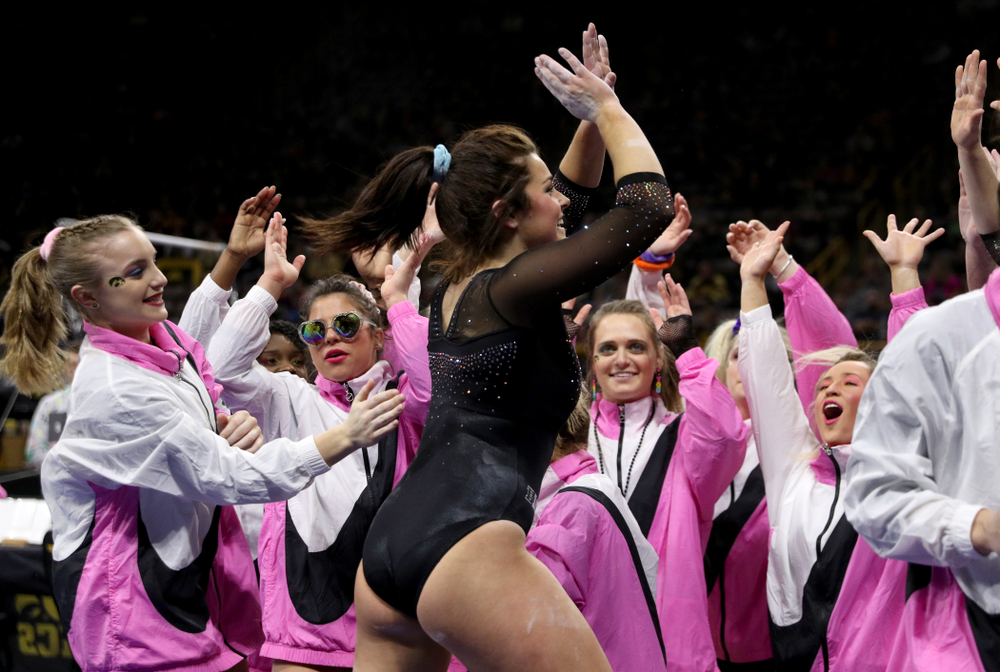 Iowa’s Erin Castle competes on the beam against Michigan Friday, February 14, 2020 at Carver-Hawkeye Arena. (Brian Ray/hawkeyesports.com)