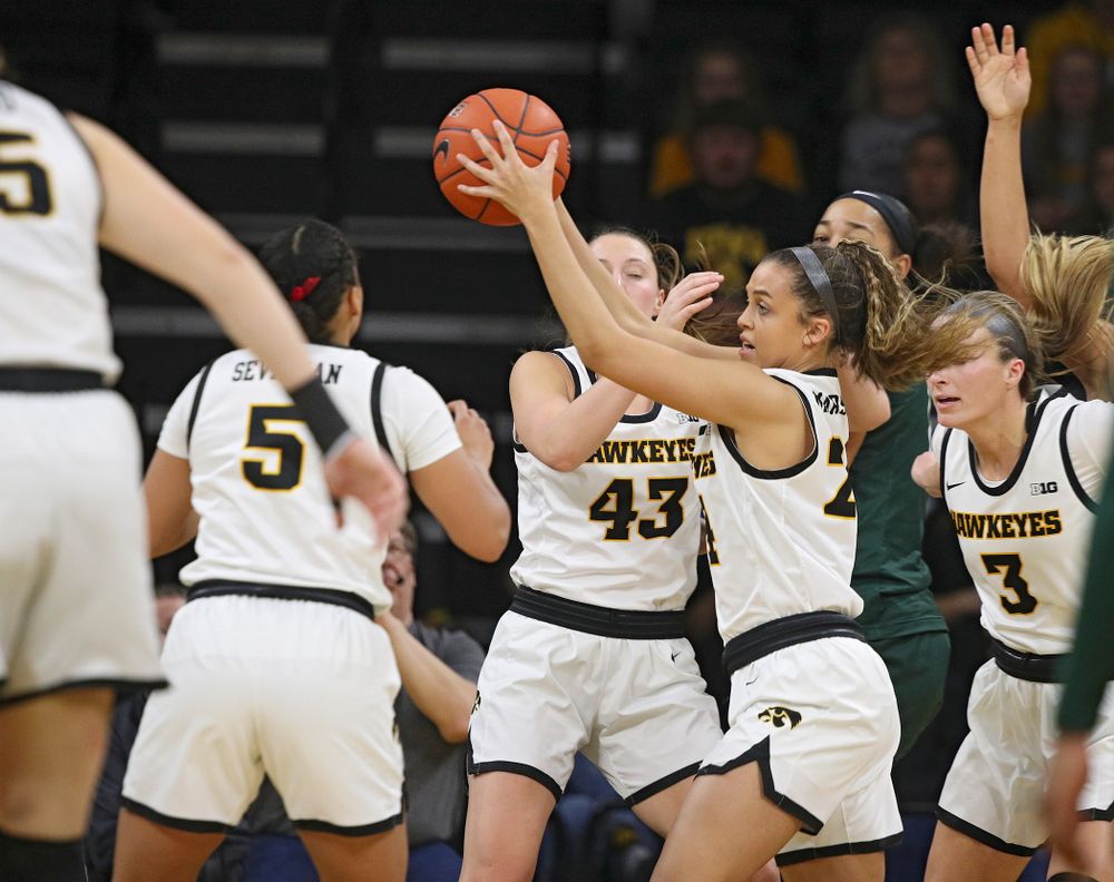 Iowa Hawkeyes guard Gabbie Marshall (24) pulls down a rebound during the second quarter of their game at Carver-Hawkeye Arena in Iowa City on Sunday, January 26, 2020. (Stephen Mally/hawkeyesports.com)