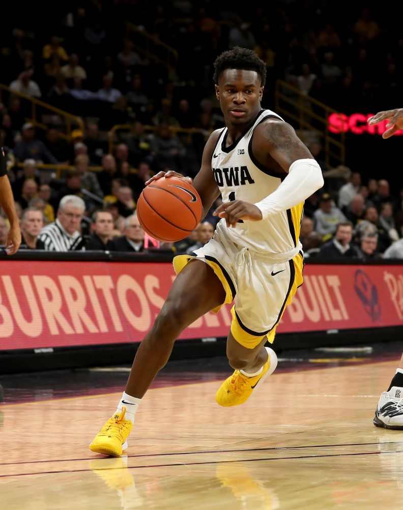 Iowa Hawkeyes guard Joe Toussaint (1) against the Minnesota Golden Gophers Monday, December 9, 2019 at Carver-Hawkeye Arena. (Brian Ray/hawkeyesports.com)