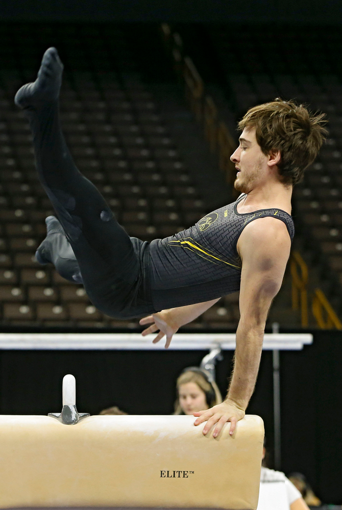 Iowa's Kevin Johnson competes in the pommel horse against Ohio State at Caver-Hawkeye Arena in Iowa City on Saturday, Mar. 16, 2019. (Stephen Mally for HawkeyeSports.com)