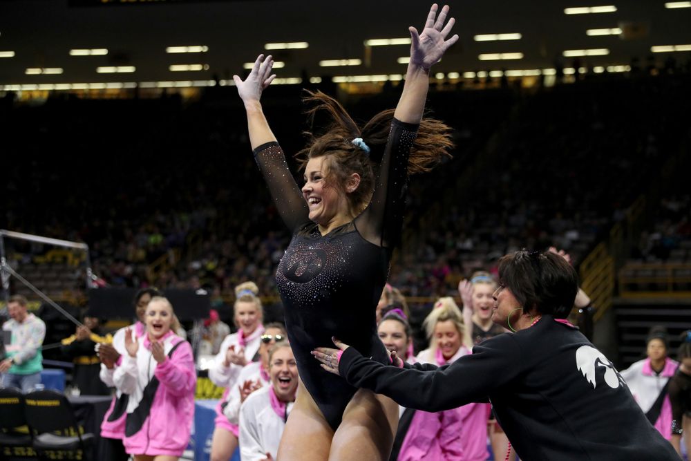 Iowa’s Erin Castle competes on the beam against Michigan Friday, February 14, 2020 at Carver-Hawkeye Arena. (Brian Ray/hawkeyesports.com)