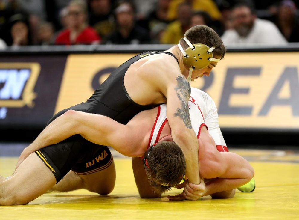 Iowa’s Abe Assad wrestles Nebraska’s Taylor Venz at 184 pounds Saturday, January 18, 2020 at Carver-Hawkeye Arena. Assad won the match 6-4. (Brian Ray/hawkeyesports.com)