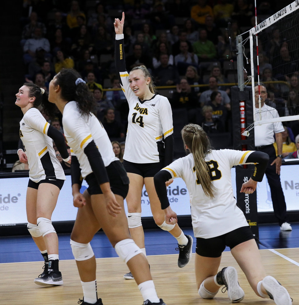 Iowa Hawkeyes outside hitter Cali Hoye (14) celebrates after winning a point during a match against Penn State at Carver-Hawkeye Arena on November 3, 2018. (Tork Mason/hawkeyesports.com)