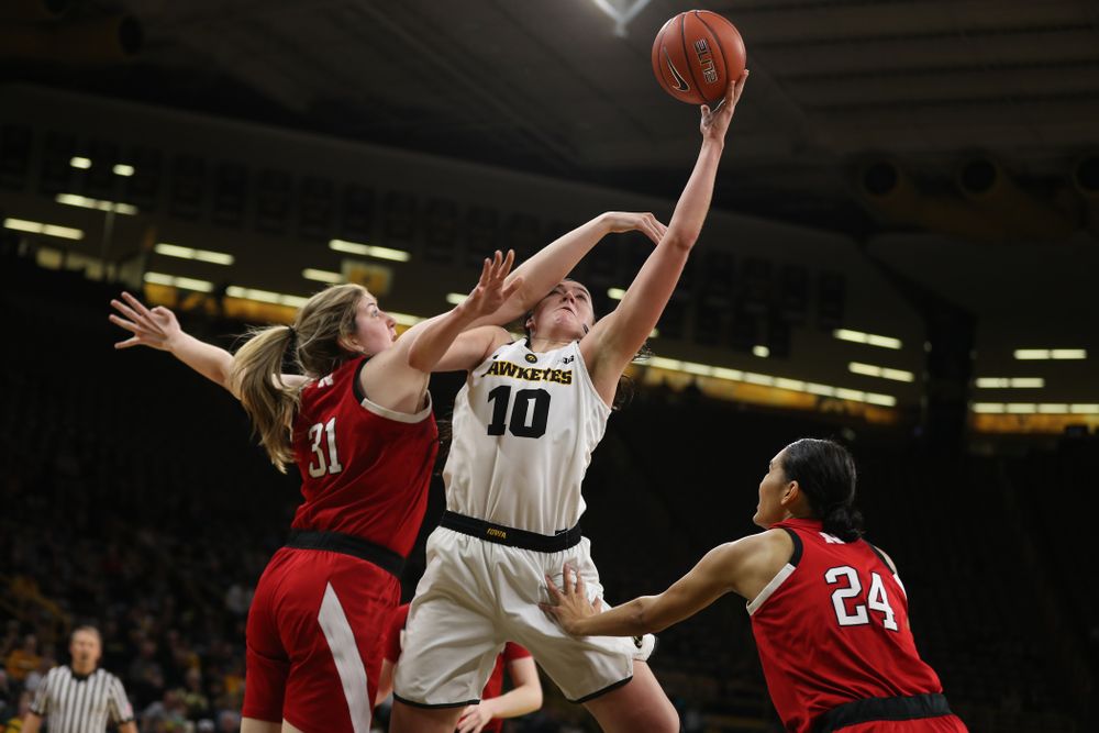 Iowa Hawkeyes forward Megan Gustafson (10) makes a basket and draws a foul against the Nebraska Cornhuskers Thursday, January 3, 2019 at Carver-Hawkeye Arena. (Brian Ray/hawkeyesports.com)
