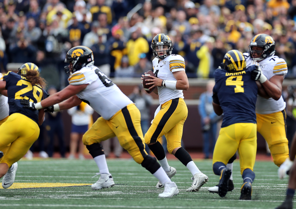 Iowa Hawkeyes quarterback Nate Stanley (4) against the Michigan Wolverines Saturday, October 5, 2019 at Michigan Stadium in Ann Arbor, MI. (Brian Ray/hawkeyesports.com)