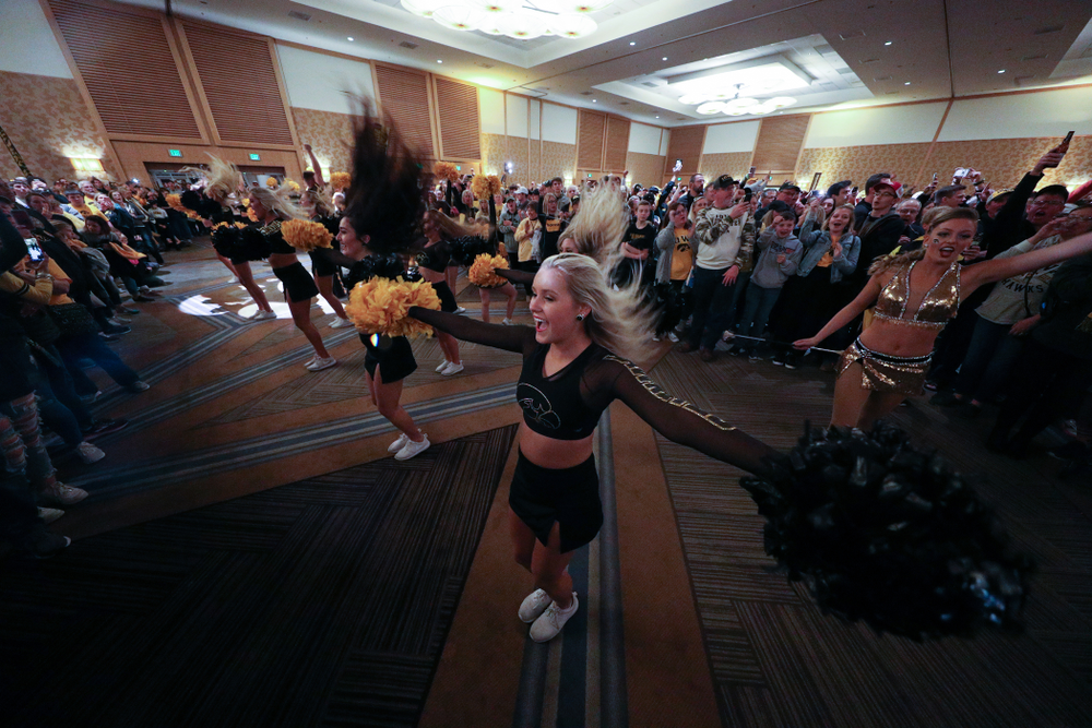 The Hawkeye Marching Band and the Iowa Spirit Squads perform during the Holiday Bowl Hawkeye Huddle Thursday, December 26, 2019 at the Hilton in downtown San Diego. (Brian Ray/hawkeyesports.com)