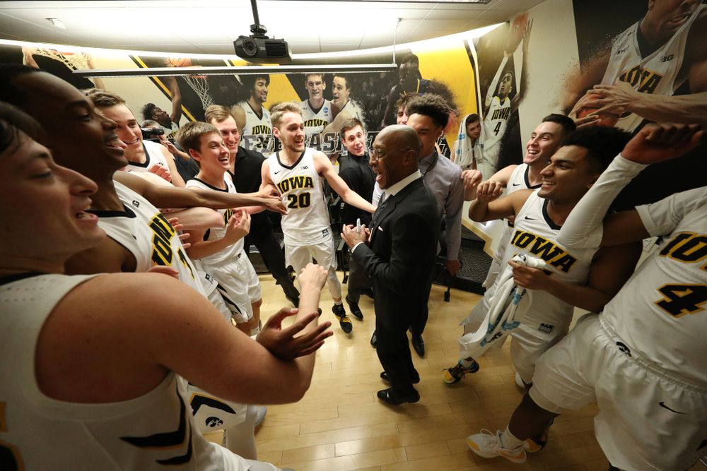 Iowa Hawkeyes assistant coach Sherman Dillard dances in the locker room following their victory over the Michigan Wolverines Friday, February 1, 2019 at Carver-Hawkeye Arena. (Brian Ray/hawkeyesports.com)