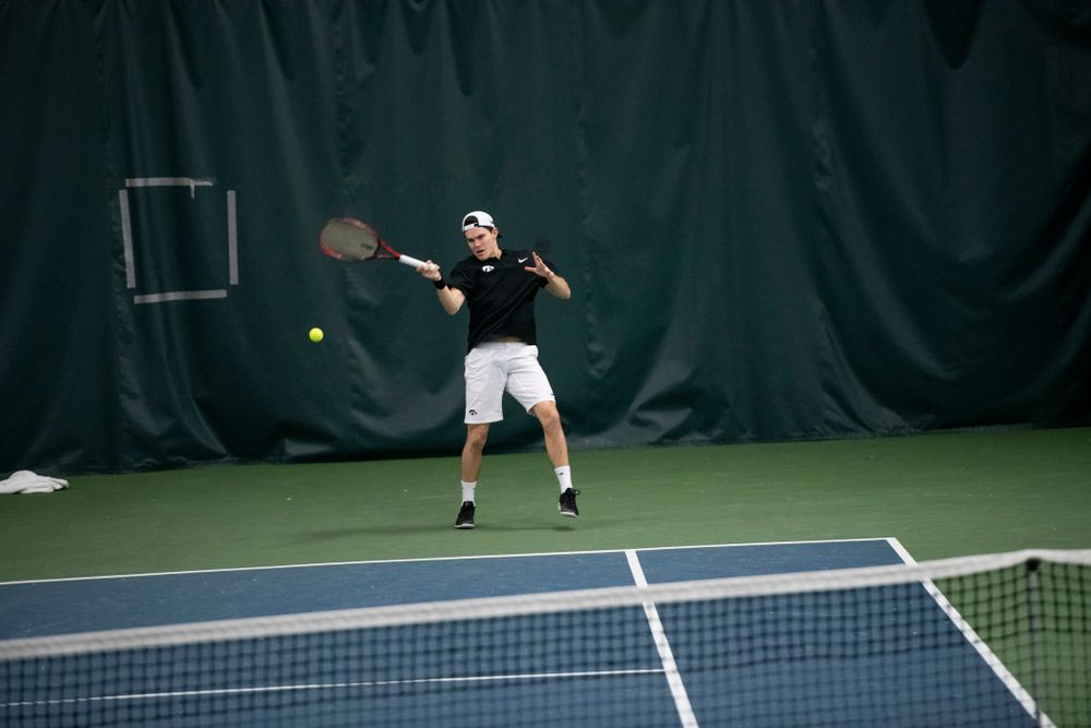 The Iowa men's tennis team competes against Cornell in The Rise Tennis Center in Ithaca, NY on Sunday, Feb. 24, 2019.