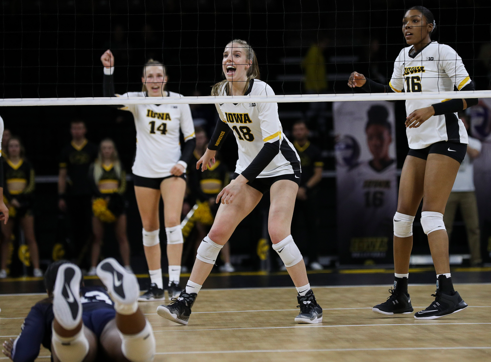 Iowa Hawkeyes middle blocker Hannah Clayton (18) celebrates after winning a point during a match against Penn State at Carver-Hawkeye Arena on November 3, 2018. (Tork Mason/hawkeyesports.com)