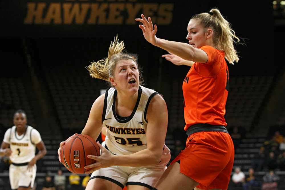 Iowa forward/center Monika Czinano (25) eyes the basket during the first quarter of their overtime win against Princeton at Carver-Hawkeye Arena in Iowa City on Wednesday, Nov 20, 2019. (Stephen Mally/hawkeyesports.com)