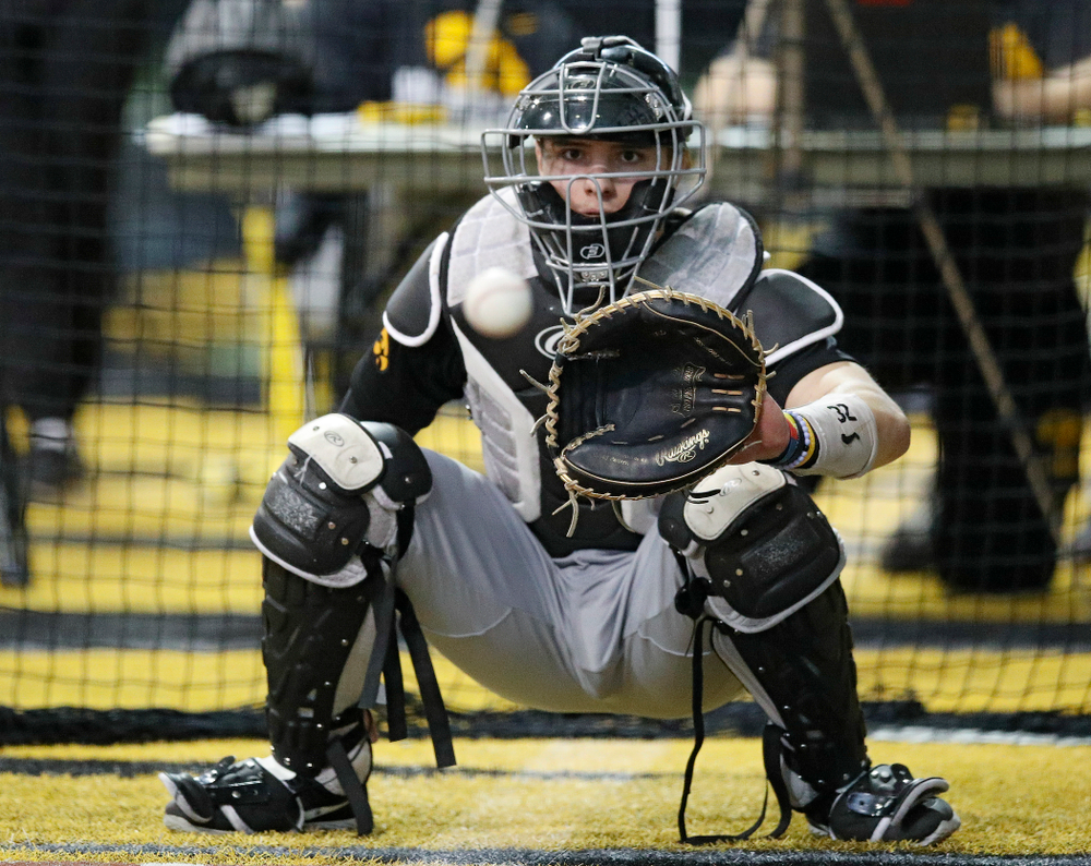 Iowa Hawkeyes catcher Brett McCleary (32) looks in a pitch during practice at the Hansen Football Performance Center in Iowa City on Friday, January 24, 2020. (Stephen Mally/hawkeyesports.com)
