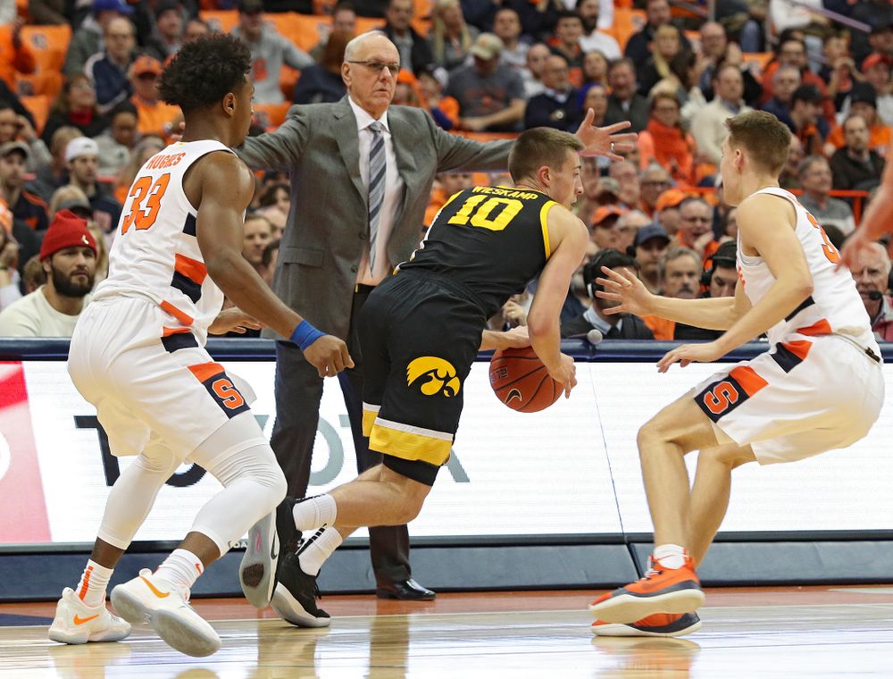 Iowa Hawkeyes guard Joe Wieskamp (10) drives with the ball during the first half of their ACC/Big Ten Challenge game at the Carrier Dome in Syracuse, N.Y. on Tuesday, Dec 3, 2019. (Stephen Mally/hawkeyesports.com)