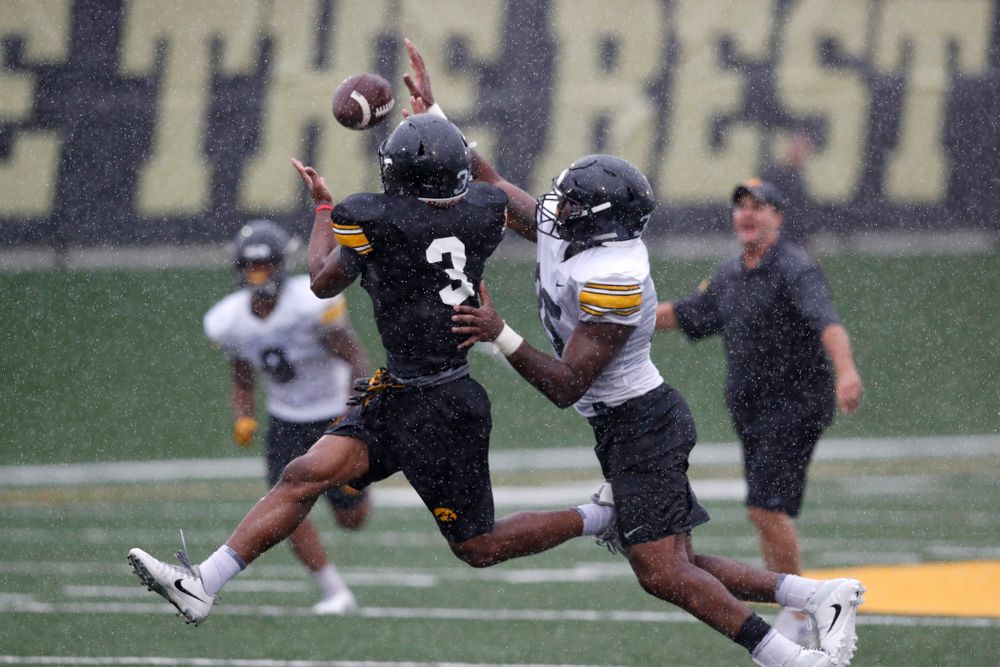 Iowa Hawkeyes wide receiver Tyrone Tracy Jr. (3) and linebacker Barrington Wade (35) during camp practice No. 15 Monday, August 20, 2018 at the Hansen Football Performance Center. (Brian Ray/hawkeyesports.com)
