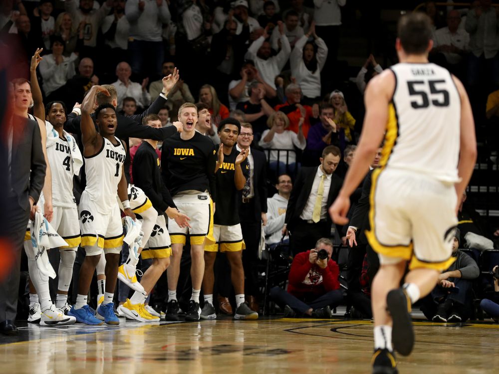 Iowa Hawkeyes forward Luka Garza (55) makes a three point basket against the Illinois Fighting Illini Sunday, February 2, 2020 at Carver-Hawkeye Arena. (Brian Ray/hawkeyesports.com)