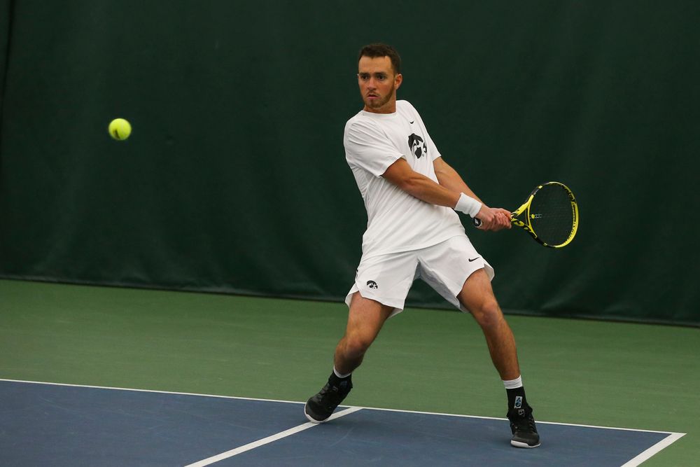 Iowa’s Kareem Allaf hits a forehand during the Iowa men’s tennis match vs Western Michigan on Saturday, January 18, 2020 at the Hawkeye Tennis and Recreation Complex. (Lily Smith/hawkeyesports.com)