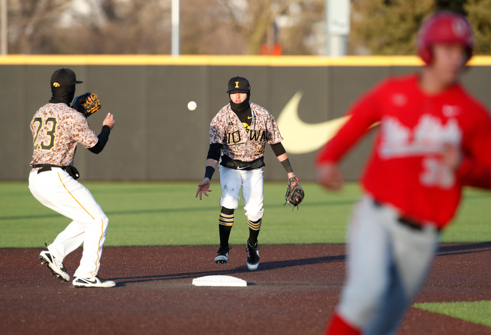 Iowa Hawkeyes infielder Mitchell Boe (4) and infielder Kyle Crowl (23) against the Ohio State Buckeyes Saturday, April 7, 2018 at Duane Banks Field. (Brian Ray/hawkeyesports.com)