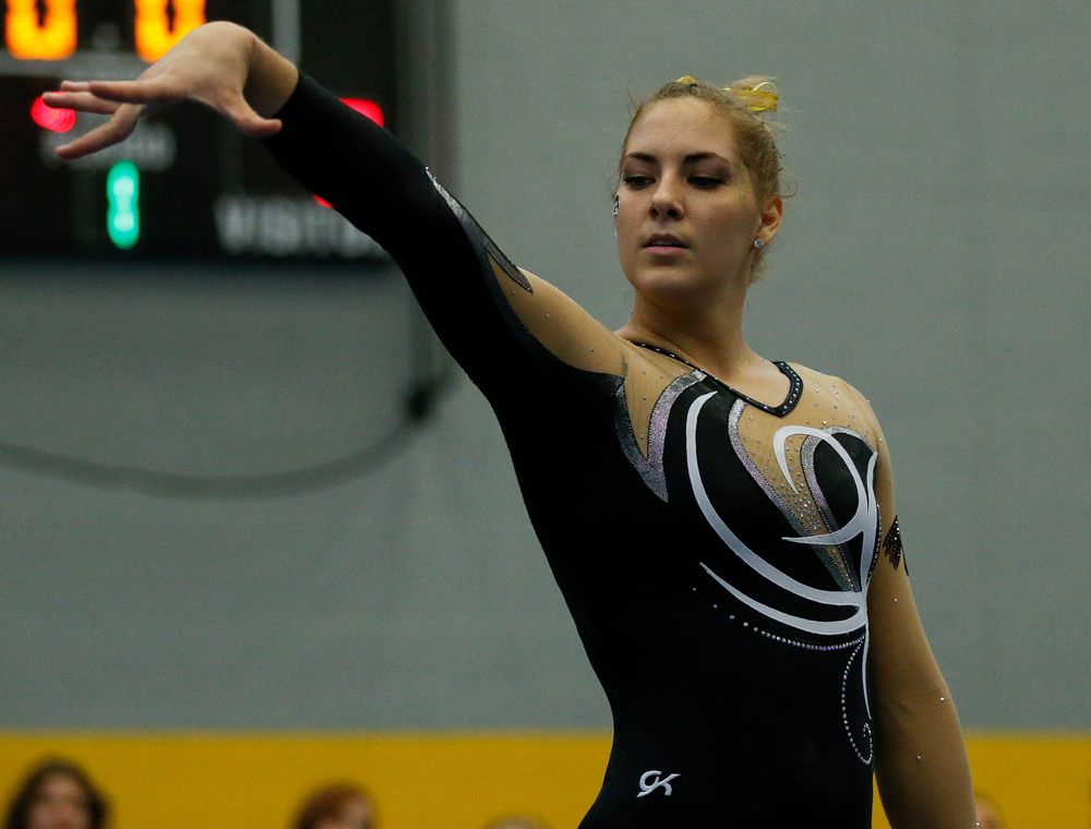 Emma Hartzler competes in the floor exercise during the Black and Gold Intrasquad meet at the Field House on 12/2/17. (Tork Mason/hawkeyesports.com)