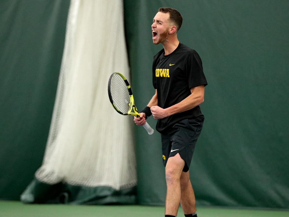 Iowa’s Kareem Allaf celebrates after wining his singles match at the Hawkeye Tennis and Recreation Complex in Iowa City on Friday, February 14, 2020. (Stephen Mally/hawkeyesports.com)