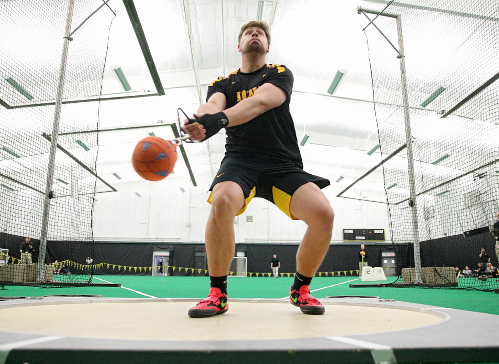 Iowa’s Jordan Hawkins throws during the men’s weight throw event at the Hawkeye Tennis and Recreation Complex in Iowa City on Friday, January 31, 2020. (Stephen Mally/hawkeyesports.com)