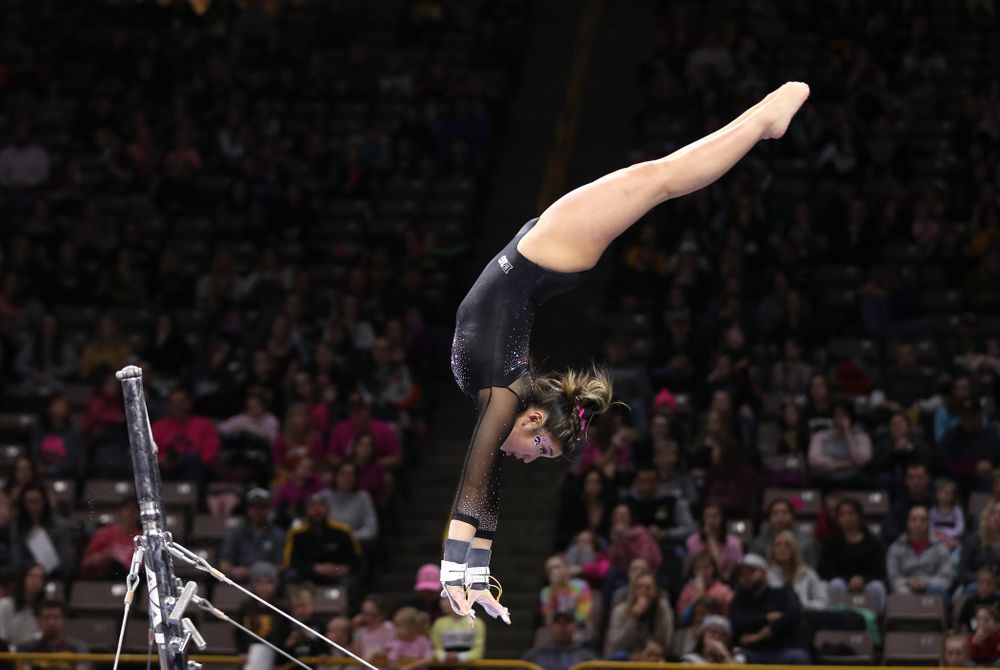 Iowa's Nicole Chow competes on the bars during their meet against the Minnesota Golden Gophers Saturday, January 19, 2019 at Carver-Hawkeye Arena. (Brian Ray/hawkeyesports.com)