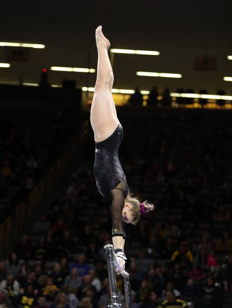 Iowa’s Allyson Steffensmeier competes on the bars against Michigan Friday, February 14, 2020 at Carver-Hawkeye Arena. (Brian Ray/hawkeyesports.com)
