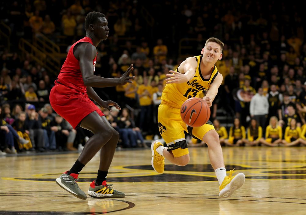 Iowa Hawkeyes guard Austin Ash (13) against the Nebraska Cornhuskers Saturday, February 8, 2020 at Carver-Hawkeye Arena. (Brian Ray/hawkeyesports.com)