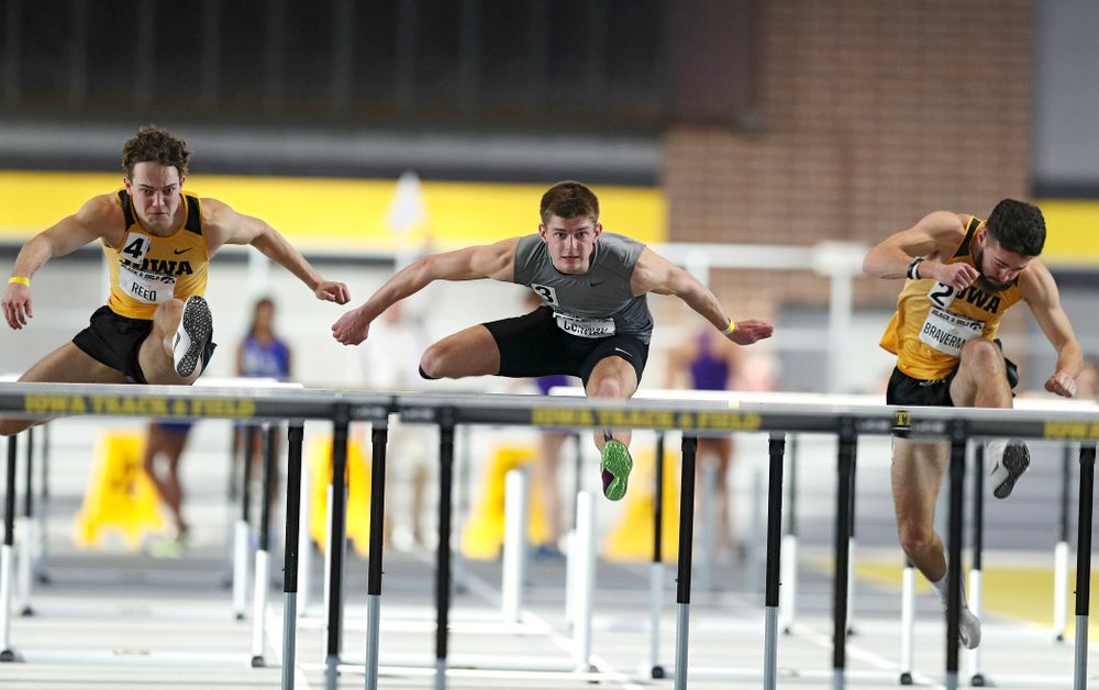 Iowa’s Gratt Reed (from left), Grant Conway, and Josh Braverman run the men’s 60 meter hurdles event at the Black and Gold Invite at the Recreation Building in Iowa City on Saturday, February 1, 2020. (Stephen Mally/hawkeyesports.com)