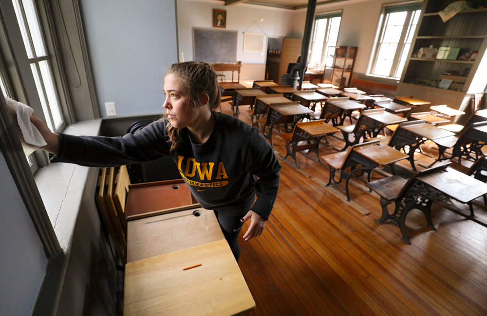 Iowa women's gymnasts clean the 1876 Coralville Schoolhouse during the 21st annual ISAAC Hawkeye Day of Caring in Coralville on Sunday, Apr. 28, 2019. (Stephen Mally/hawkeyesports.com)