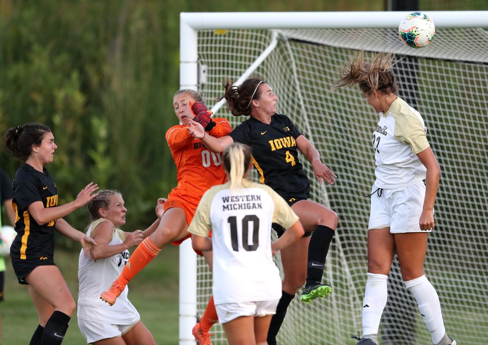 Iowa Hawkeyes forward Kaleigh Haus (4) heads the ball into the goal against Western Michigan Thursday, August 22, 2019 at the Iowa Soccer Complex. (Brian Ray/hawkeyesports.com)