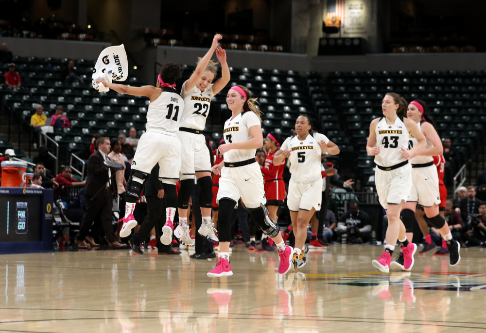 Iowa Hawkeyes guard Tania Davis (11) and guard Kathleen Doyle (22) against the Rutgers Scarlet Knights in the semi-finals of the Big Ten Tournament Saturday, March 9, 2019 at Bankers Life Fieldhouse in Indianapolis, Ind. (Brian Ray/hawkeyesports.com)