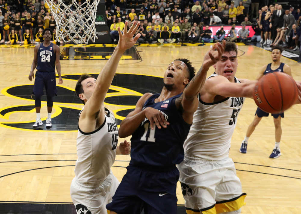 Iowa Hawkeyes forward Luka Garza (55) blocks a shot against Penn State Saturday, February 29, 2020 at Carver-Hawkeye Arena. (Brian Ray/hawkeyesports.com)