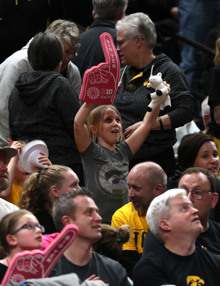 A little girl holds up a stuffed goat as the Iowa Hawkeyes take on the Rutgers Scarlet Knights in the semi-finals of the Big Ten Tournament Saturday, March 9, 2019 at Bankers Life Fieldhouse in Indianapolis, Ind. (Brian Ray/hawkeyesports.com)