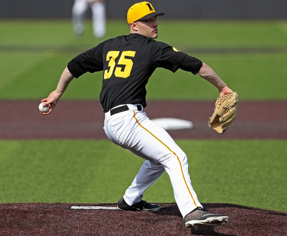 Iowa Hawkeyes pitcher Cam Baumann (35) delivers to the plate during the sixth inning of their game against Rutgers at Duane Banks Field in Iowa City on Saturday, Apr. 6, 2019. (Stephen Mally/hawkeyesports.com)