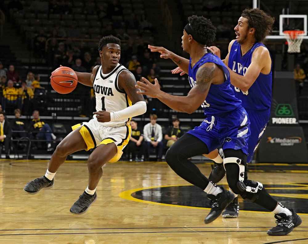 Iowa Hawkeyes guard Joe Toussaint (1) drives with the ball during the first half of their exhibition game against Lindsey Wilson College at Carver-Hawkeye Arena in Iowa City on Monday, Nov 4, 2019. (Stephen Mally/hawkeyesports.com)