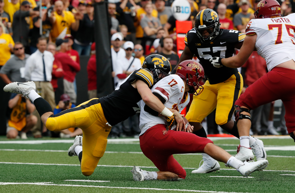Iowa Hawkeyes linebacker Nick Niemann (49) sacks Iowa State Cyclones quarterback Kyle Kempt (17) Saturday, September 8, 2018 at Kinnick Stadium. (Brian Ray/hawkeyesports.com)